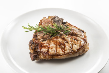 Grilled t-bone chop of pork
