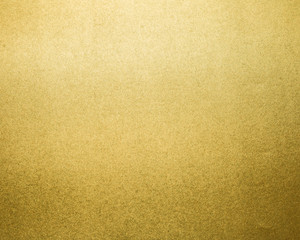 Golden texture background. Paper glitter material.