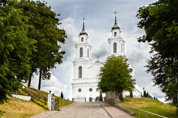 Fototapeta na wymiar The Catholic church in Ludza, Latvia in summer cloudy day
