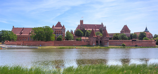 A medieval, built of red brick, castle of Teutonic Order in Malbork, Gdansk Pomerania in Poland © stepmar