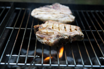 T-bone chop of pork on the grill