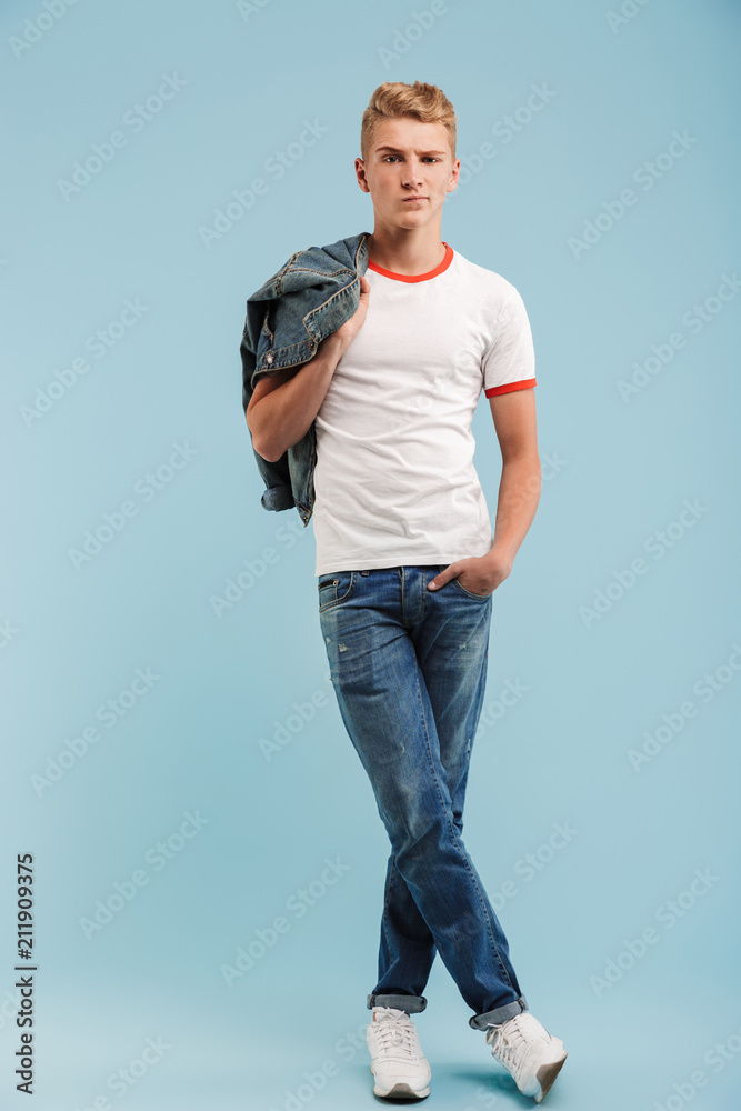 Poster Full length portrait of a cute casual teenage boy