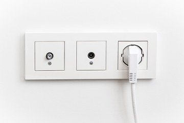 Electric plug at the wall
