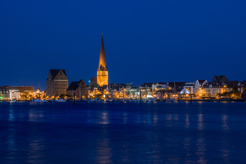 Rostock. Night Panorama view to Rostock in Germany. River Warnow and City port.