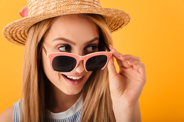 Close up portrait of a cheerful young blonde woman