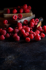 Fresh raspberries on a dark background