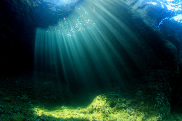 Sunlight in underwater cave 