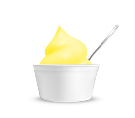 Lemon ice cream in a cup with a spoon