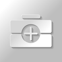 Obraz premium first-aid kit, simple icon. Paper style with shadow on gray back