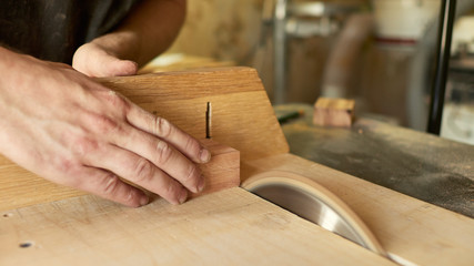 Cutting the blanks on the tailblock. Lautner makes a classic guitar.