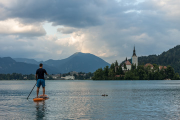 stand up paddle boarding on the lake