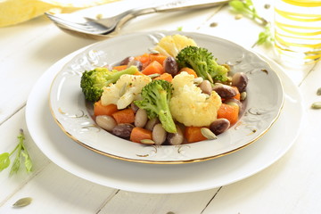 Broccoli, cauliflower, squash and beans with pumpkin seeds