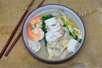 Wide noodles in a creamy gravy sauce