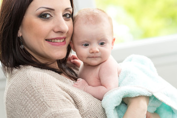 Portrait of mother and baby