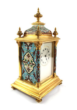 Highly Ornate Gold Clock on White Background