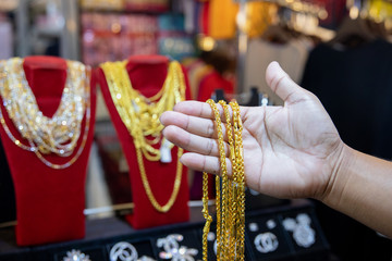 Fototapeta na wymiar gold jewelry in gold shop