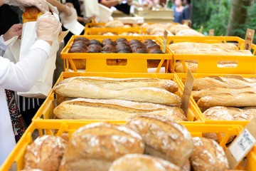 Homemade bread and baguettes at outdoor market
