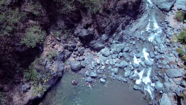 Aerial drone video of a scenic and beautiful Natividad waterfalls in the Philippines, Southeast Asia.
