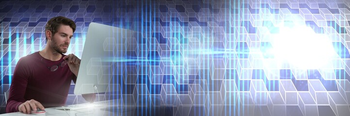 Man using computer with geometric transitions