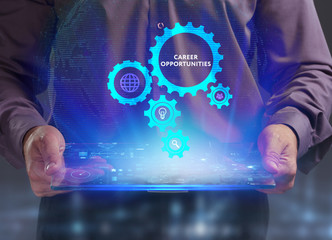 The concept of business, technology, the Internet and the network. A young entrepreneur working on a virtual screen of the future and sees the inscription: Career opportunities