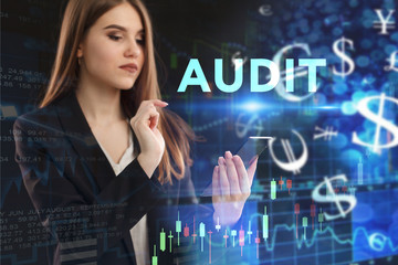 The concept of business, technology, the Internet and the network. A young entrepreneur working on a virtual screen of the future and sees the inscription: Audit