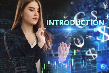 The concept of business, technology, the Internet and the network. A young entrepreneur working on a virtual screen of the future and sees the inscription: introduction