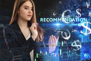 The concept of business, technology, the Internet and the network. A young entrepreneur working on a virtual screen of the future and sees the inscription: Recommendation