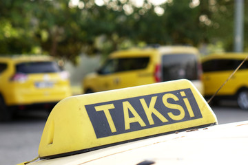 Taxi in Turkey. Taxi car roof sign on bokeh background in Istanbul .