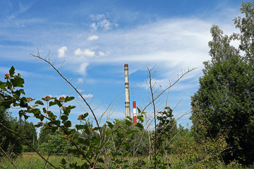 Obraz premium factory pipes and nature