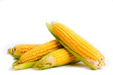 Corn bright juicy vegetarian shot over white background