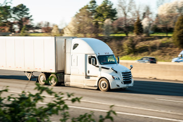 This image shows a heavy truck on the highway. 
