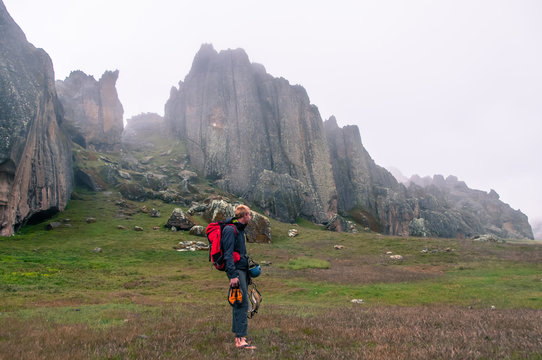 Rock climber at Hatun Machay, Huaraz, Ancash, Peru