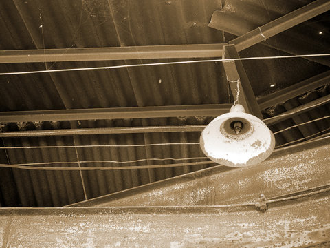 ceiling of an abandoned hydroelectric power station, sepia