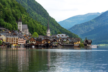 Fototapeta premium Scenic postcard view of the famous Hallstatt in the Austrian Alps in the summer morning, Salzkammergut district, Austria. View from the south