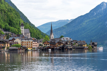 Scenic postcard view of the famous Hallstatt in the Austrian Alps in the summer morning, Salzkammergut district, Austria. View from the south