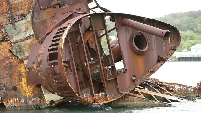 Slow motion clip of the Alexander, a shipwreck in Dixon Cove, Roatan, Honduras.