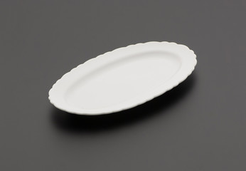 ceramic kitchen plate on black background