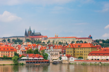 Fototapeta na wymiar View on Vltava river and St.Vitus cathedral in Prague, Czech Republic