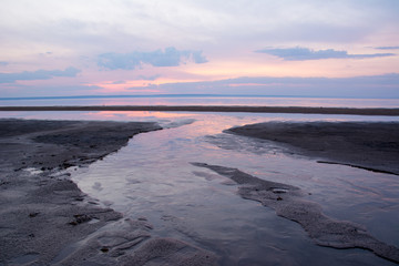 Beautiful spring sunset over a river Volga near Ulyanovsk. The widest place of the Volga River.