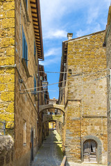 Bagnoregio, Italy - Historic center of Bagnoregio old town quarter with a narrow back street and...
