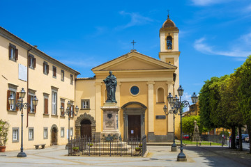 Obraz premium Bagnoregio, Italy - Annunciation Church and Saint Augustin statue in historic center of old town quarter at Piazza Sant’Agostino square