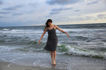 Woman on the sea coast