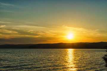Summer landscape with a view of lake Baikal from Listvyanka vill