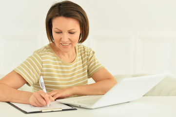 Young woman working with laptop