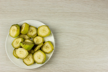 Cut banana. Fresh summer food concept. Vegetarian healthy diet