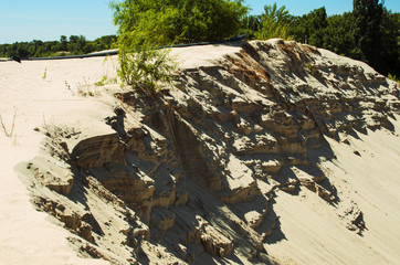 sand mountain , the yellow sand of the desert against the blue sky . can be background