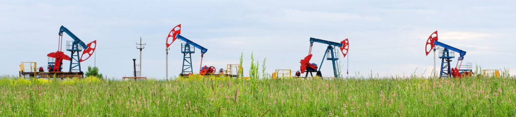Oil production on the background of sky