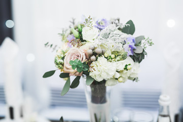 Wonderful luxury wedding bouquet of different flowers
