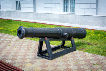 Black medieval cannon defends the city