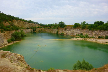 Fototapeta na wymiar Flooded quarry in Mikulov, South Moravia, Czech Republic, Central Europe